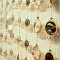 <i>Dreamscape, Chandelier #17</i>, 1999-2000, detail installation view. Ian Potter Museum of Art. glass, embroidery looms, fishing tackle, photographs, watercolour, printed lenses, crystal beads, printed chiffon. Dimensions variable
