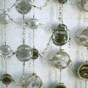 <i>Chandeliers #17,#18,#19</i>, 2000, installation view. Yarra Sculpture Space. glass, embroidery looms, fishing tackle, photographs, watercolour, printed lenses, crystal beads, printed chiffon, magnifying glass. Dimensions variable