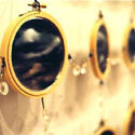 <i>Dreamscape</i>, Chandelier detail, 1999-2000, installation view. Ian Potter Museum of Art. glass, embroidery looms, fishing tackle, photographs, watercolour, printed lenses, crystal beads, printed chiffon. Dimensions variable