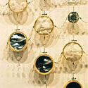 <i>Dreamscape, Chandelier #17</i>, 1999-2000, detail installation view. Ian Potter Museum of Art. glass, embroidery looms, fishing tackle, photographs, watercolour, printed lenses, crystal beads, printed chiffon. Dimensions variable