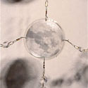<i>Dreamscape</i>, Chandelier detail, 1999-2000, installation view. Ian Potter Museum of Art. glass, embroidery looms, fishing tackle, photographs, watercolour, printed lenses, crystal beads, printed chiffon. Dimensions variable