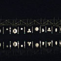 <i>Nestings</i>, 2011 Lorne Sculpture Prize. Recycled plastic, water, glass rocks, steel cable. Dimensions variable- 50mt span across bridge 